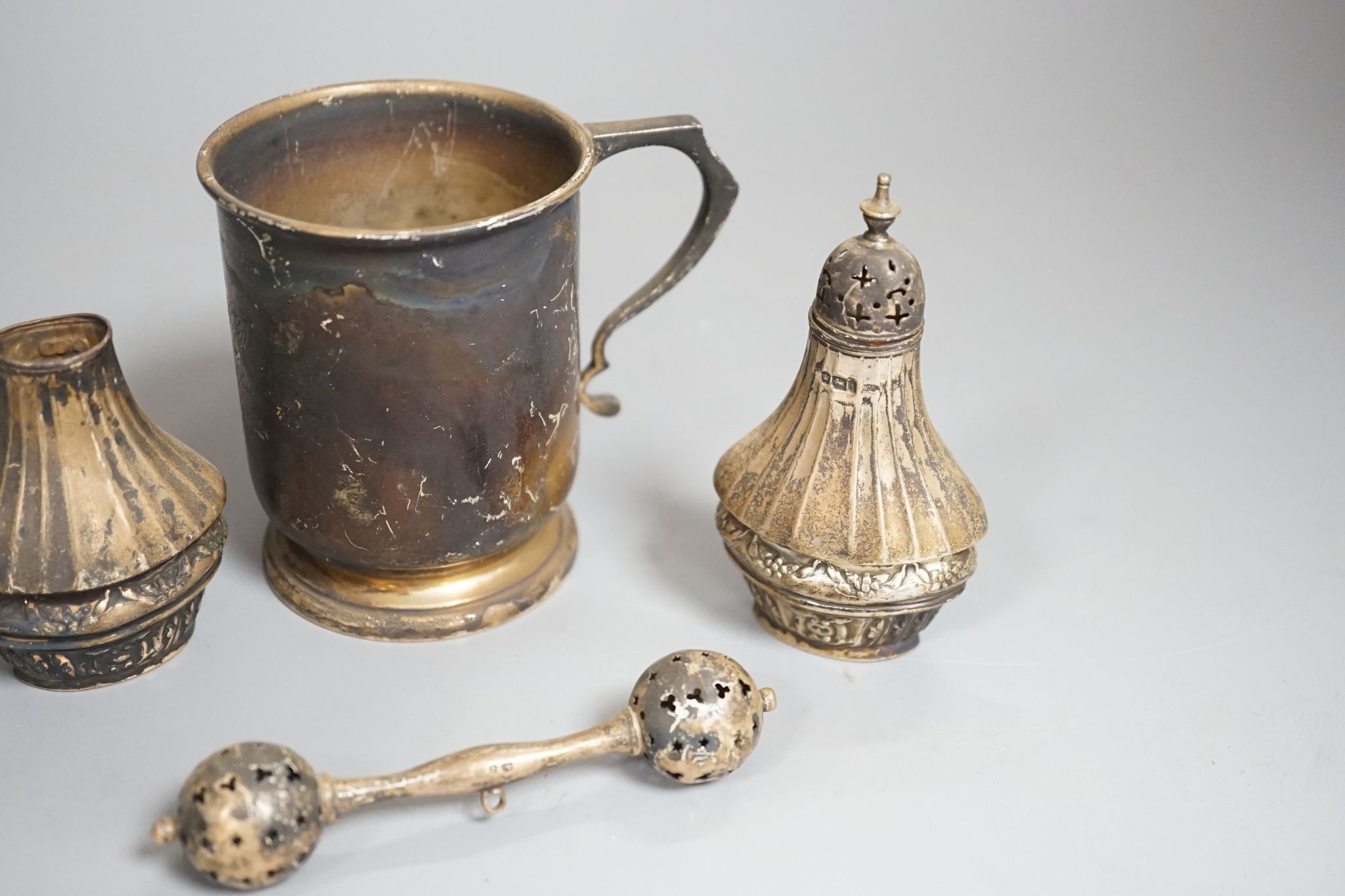 A 1930's silver christening mug, 85mm and three other items including a 9ct and white metal ring shank.